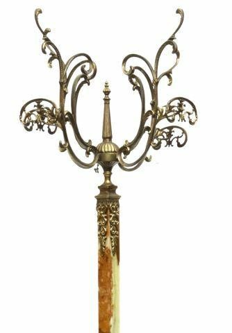 Appraisal: Italian standing hall tree th c flame finial four gilt