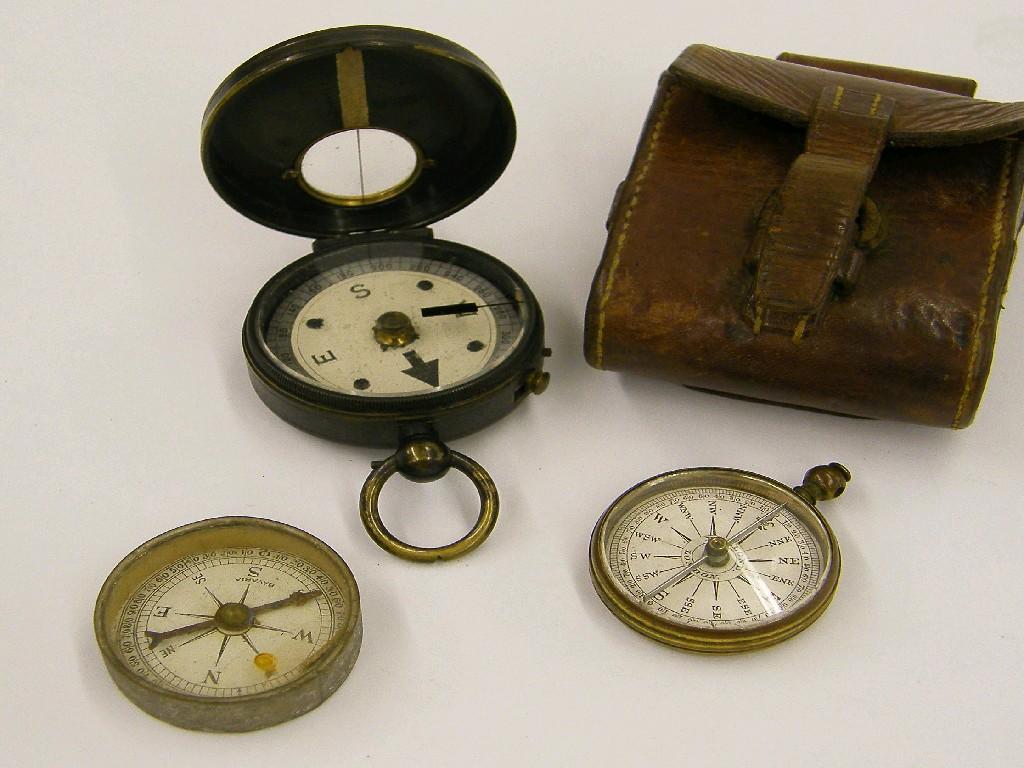 Appraisal: Three interesting pocket compasses one with leather case