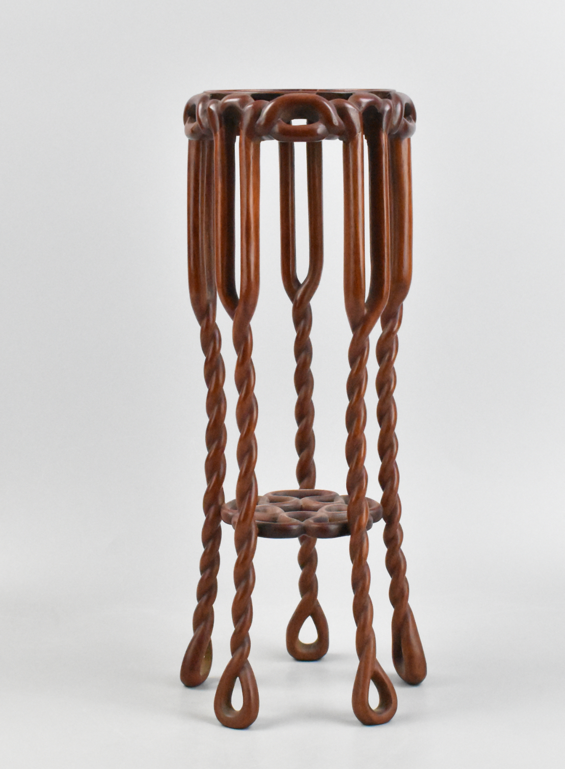 Appraisal: Chinese table stand raised on five long twisted legs circular