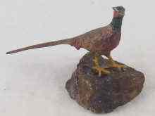 Appraisal: A cold painted bronze pheasant on a blue john rocky