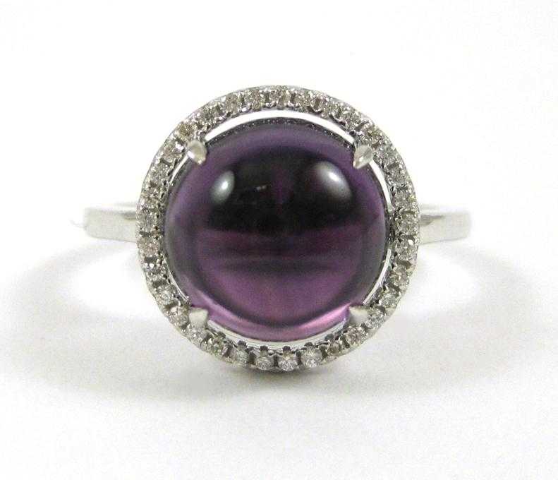 Appraisal: AMETHYST DIAMOND AND FOURTEEN KARAT GOLD RING The white gold