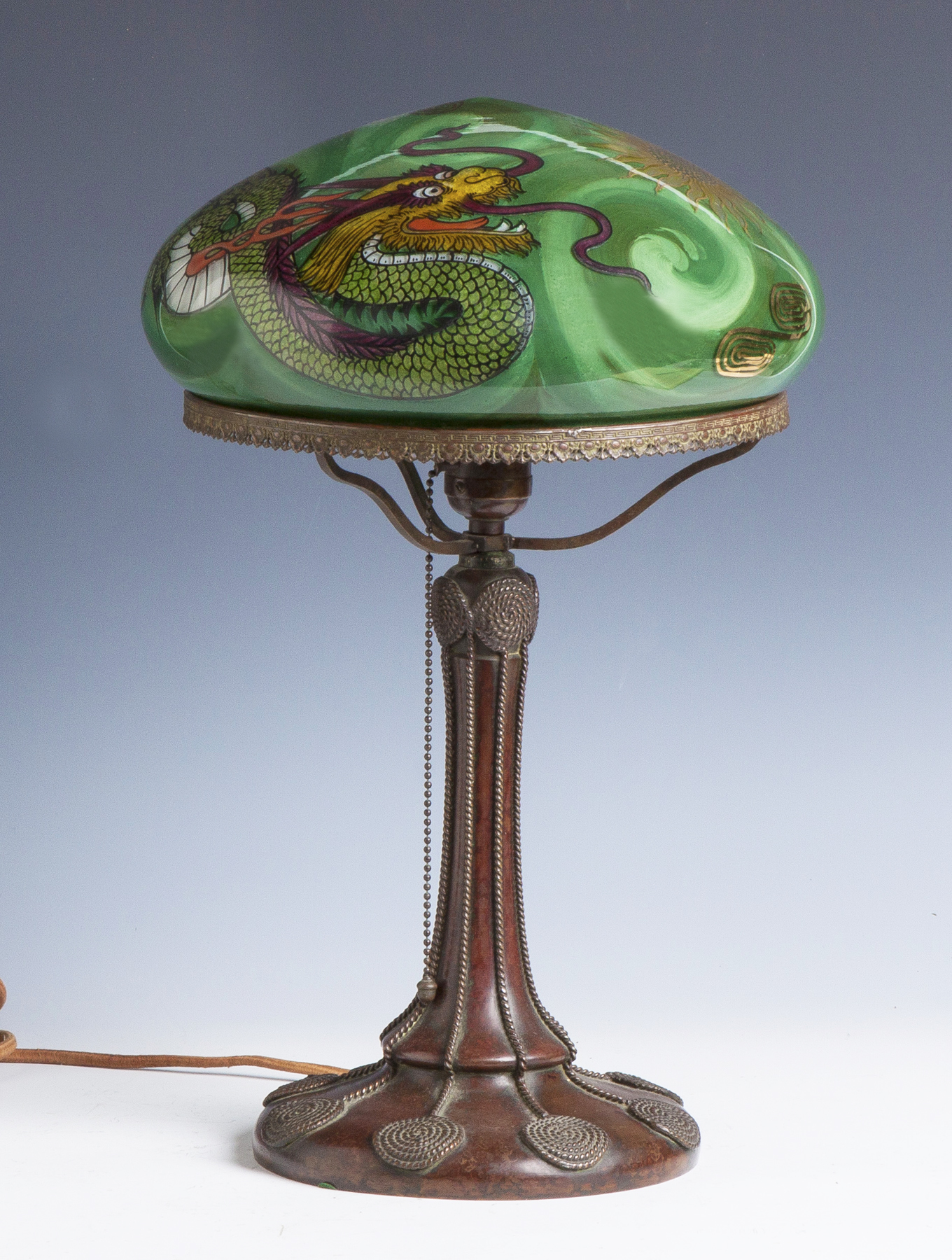 Appraisal: Handel Table Lamp with Reverse Painted Dragon Rope twist decorated