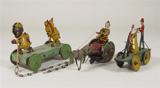 Appraisal: Three Lithographed Tin Toys Circa Girard Toys wind-up railroad handcart