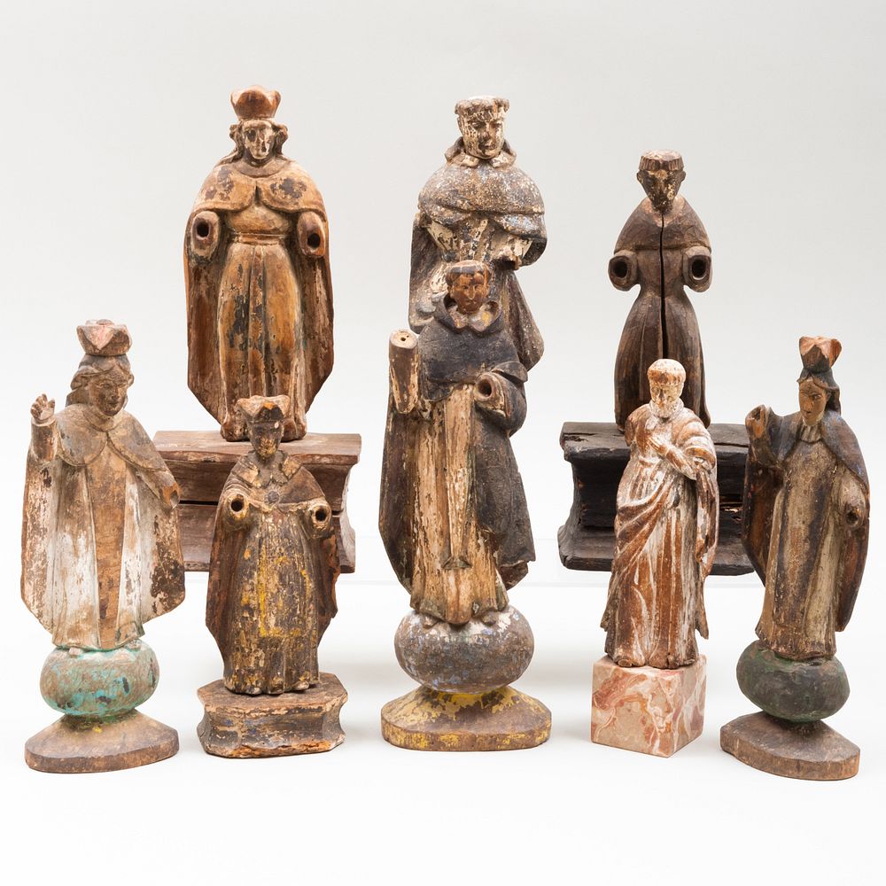 Appraisal: Group of Eight Carved and Polychromed Devotional Figures One mounted