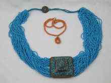 Appraisal: A Middle Eastern belt made from turquoise coloured beads with