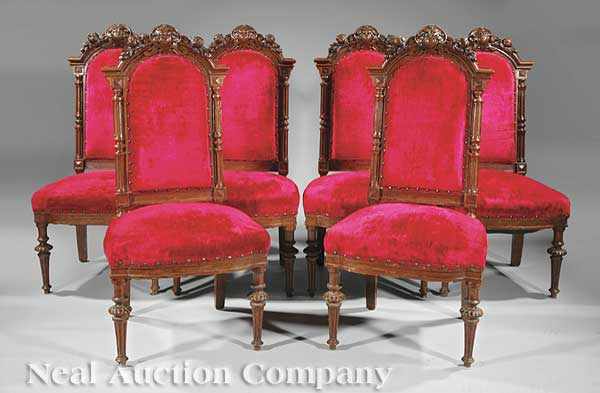 Appraisal: A Set of Eight American Highly Carved Oak Dining Chairs