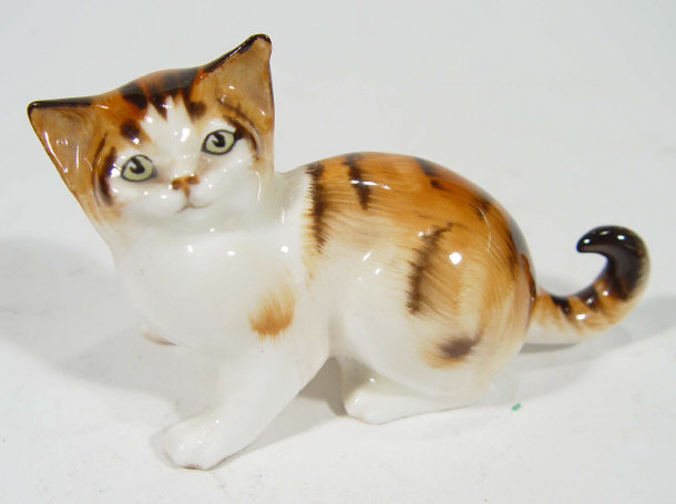 Appraisal: Hand painted Royal Doulton tortoiseshell cat HN factory mark to