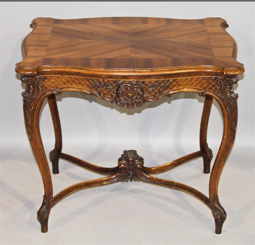 Appraisal: CARVED WALNUT LOUIS XV STYLE TABLE having a rectangular top