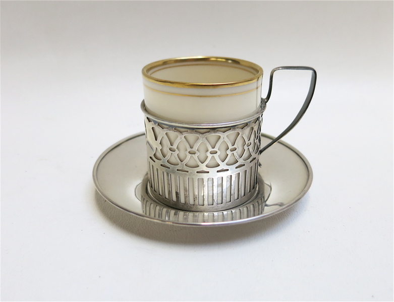 Appraisal: SET OF NINE DEMITASSE CUPS AND SAUCERS sterling silver pierced