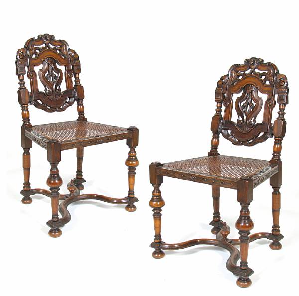 Appraisal: A pair of Italian Baroque style mixed wood side chairs