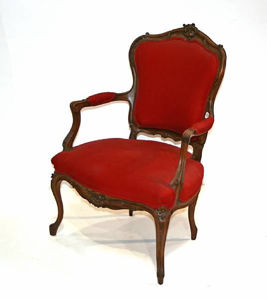 Appraisal: A pair of Louis XV style walnut fauteuils late th