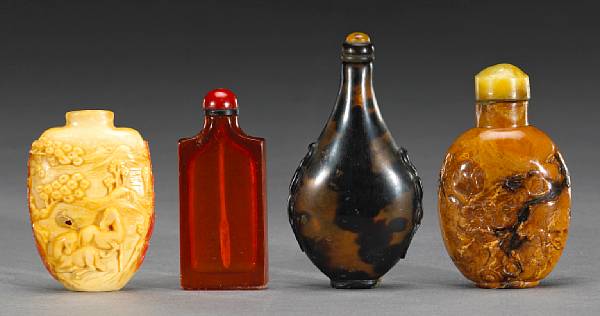 Appraisal: A group of four snuff bottles The first a hornbill