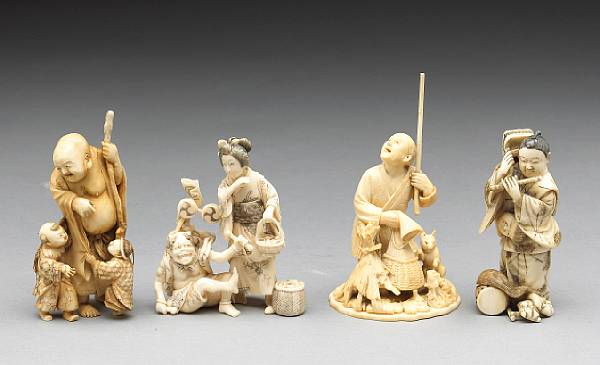 Appraisal: A group of four ivory figural okimono Including an itinerant