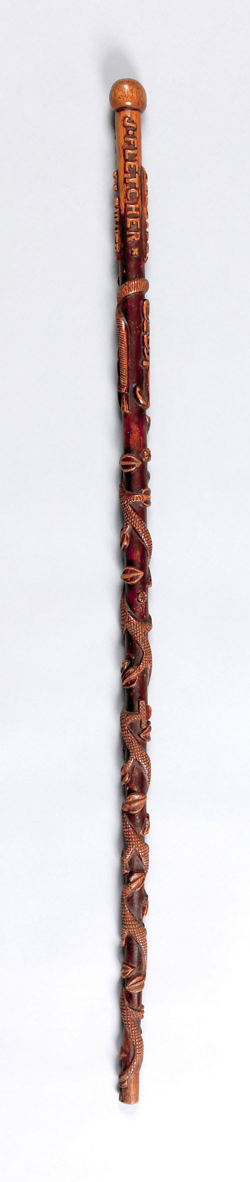 Appraisal: Pennsylvania cane with relief carved and crosshatched vine and leaf