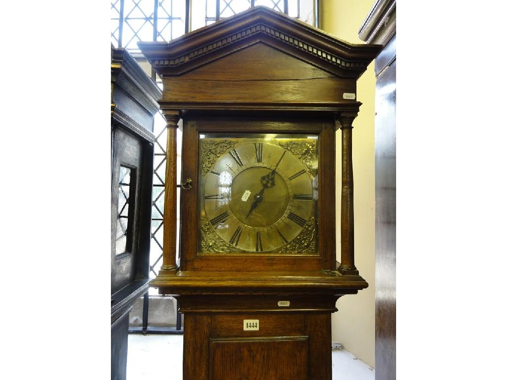 Appraisal: An oak longcase clock the architectural hood enclosing a square