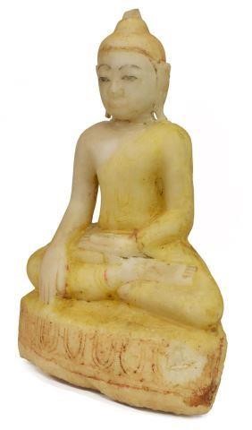 Appraisal: Burmese carved stone Buddha seated in Bhumisparsha earth-touching Mudra elongated