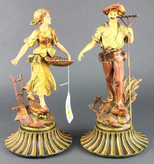 Appraisal: Pair of Continental style figural tole decorated metal sculptures circa