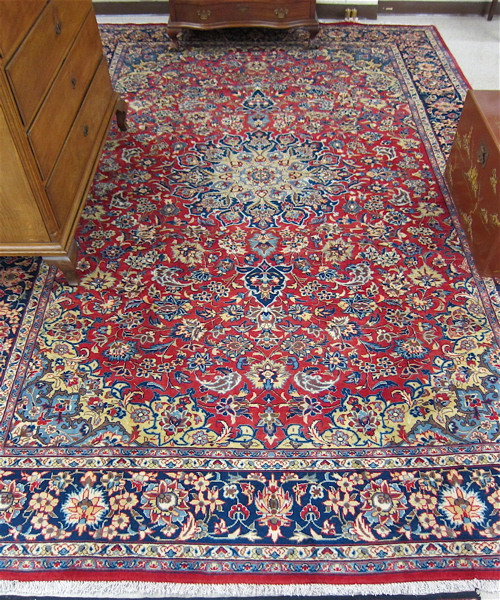 Appraisal: PERSIAN NAJAFABAD CARPET Isfahan Province central Iran floral and central