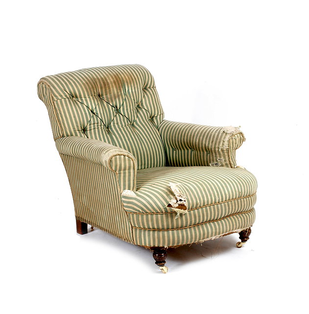 Appraisal: A VICTORIAN CLUB ARMCHAIR with button upholstered back and scrolling