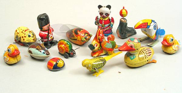 Appraisal: A collection of approximately Japanese and German lithographed tin toys