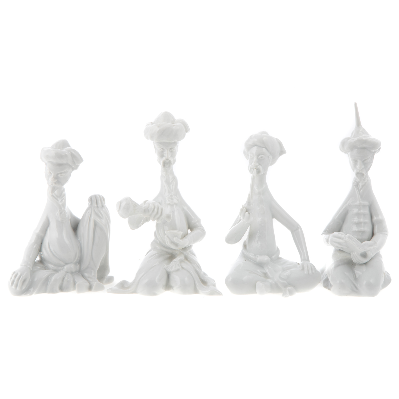 Appraisal: FOUR HEREND WHITE PORCELAIN PERSIAN FIGURES Includes contemplative man wine