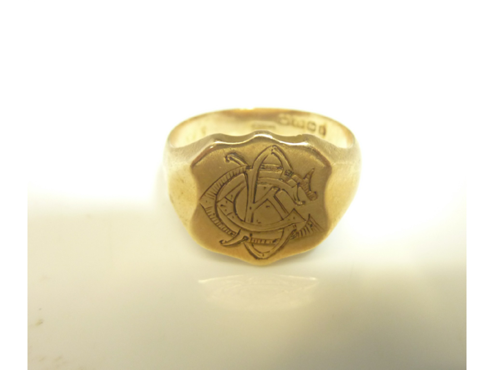 Appraisal: An ct gold signet ring the shield-shaped motif with monogram