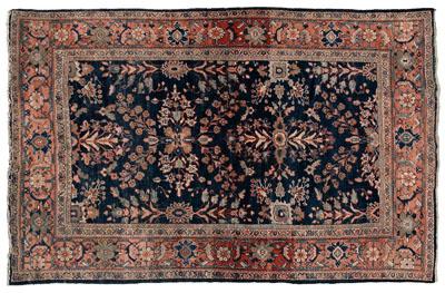 Appraisal: Persian rug repeating floral designs on dark blue field probably