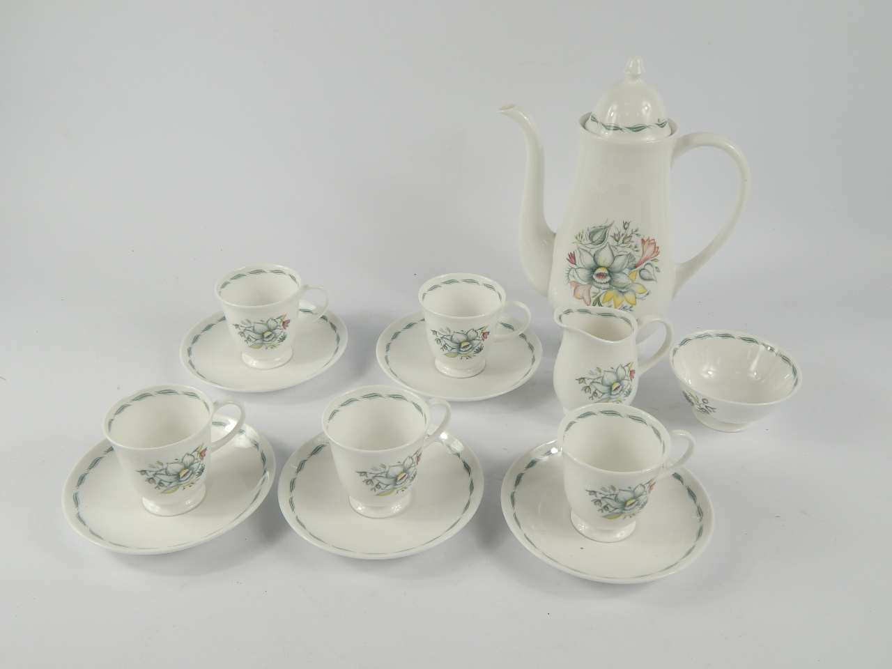 Appraisal: A Susie Cooper porcelain part coffee service decorated in the