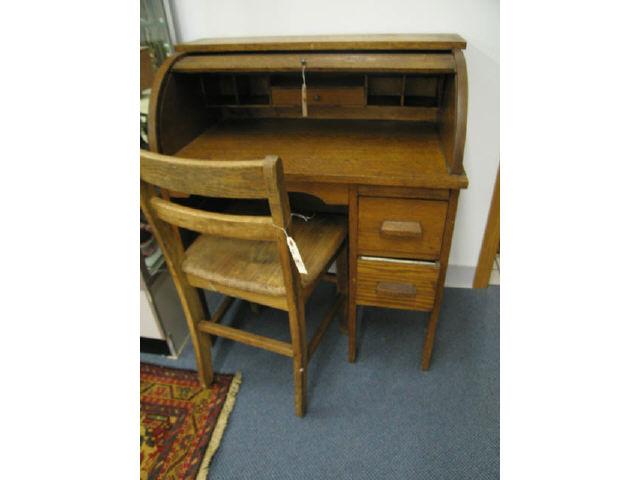 Appraisal: Antique Chld's Roll Top Desk Chair interior compartments canvas on