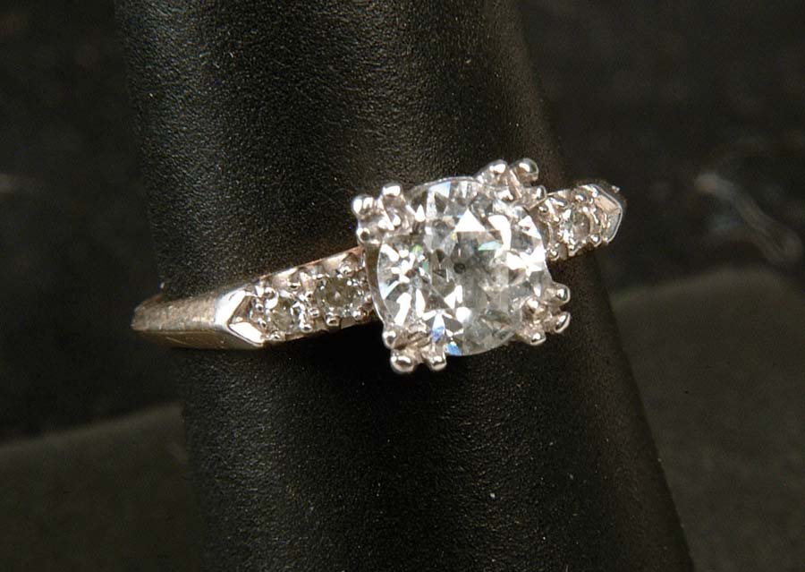 Appraisal: CT DIAMOND SOLITAIRE Lovely round diamond measuring approx mm is