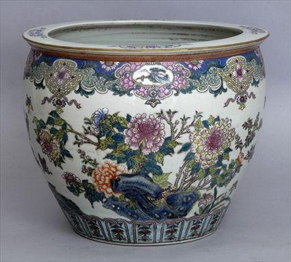 Appraisal: FAMILLE ROSE ENAMEL-DECORATED PORCELAIN FISH BOWL The exterior with a