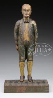 Appraisal: CAST IRON DOORSTOP OF A STANDING BUTLER Circa Bradley Hubbard