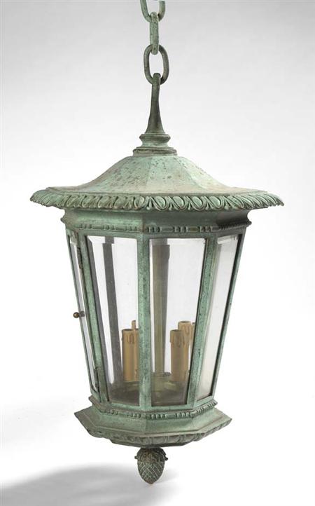 Appraisal: An octagonal bronze hall lantern the pagoda form top with