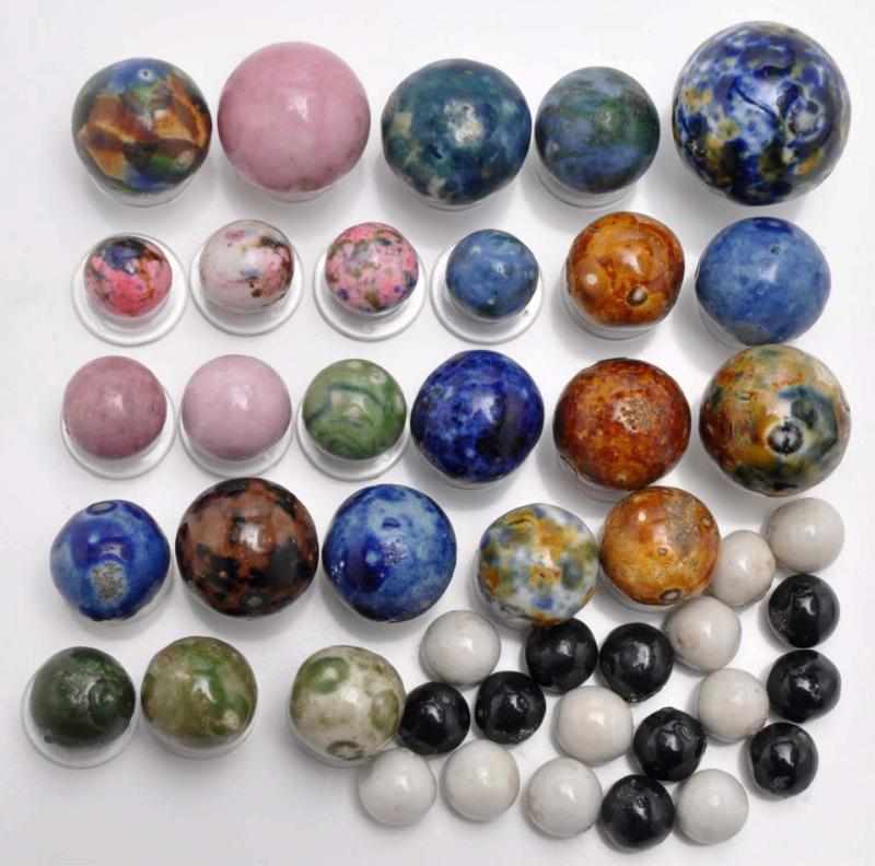 Appraisal: Lot of Hard-to-Find Bennington-Type Marbles Description Includes black and white