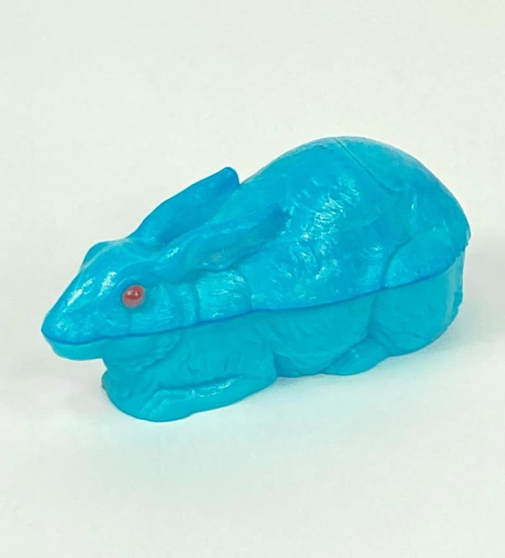 Appraisal: ATTERBURY BLUE OPAQUE PRESSED GLASS FIGURAL RABBIT BOX WITH RED