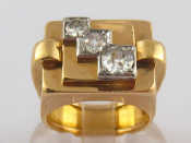 Appraisal: A French hallmarked carat gold three stone old brilliant cut