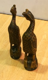 Appraisal: A pair of carved polychrome painted figures of ducks cm