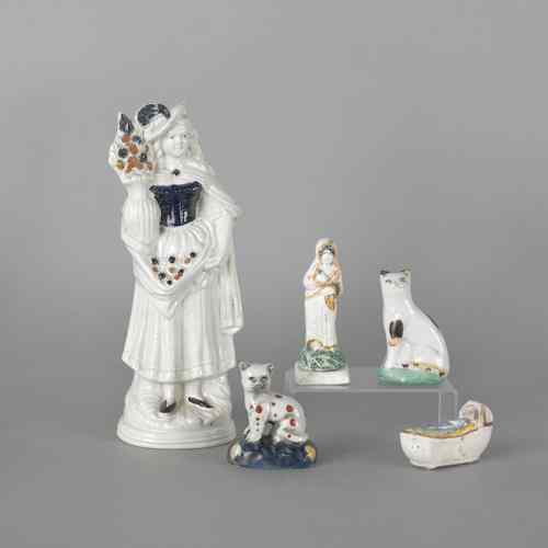 Appraisal: Three Prattware figures th c together with two Staffordshire style