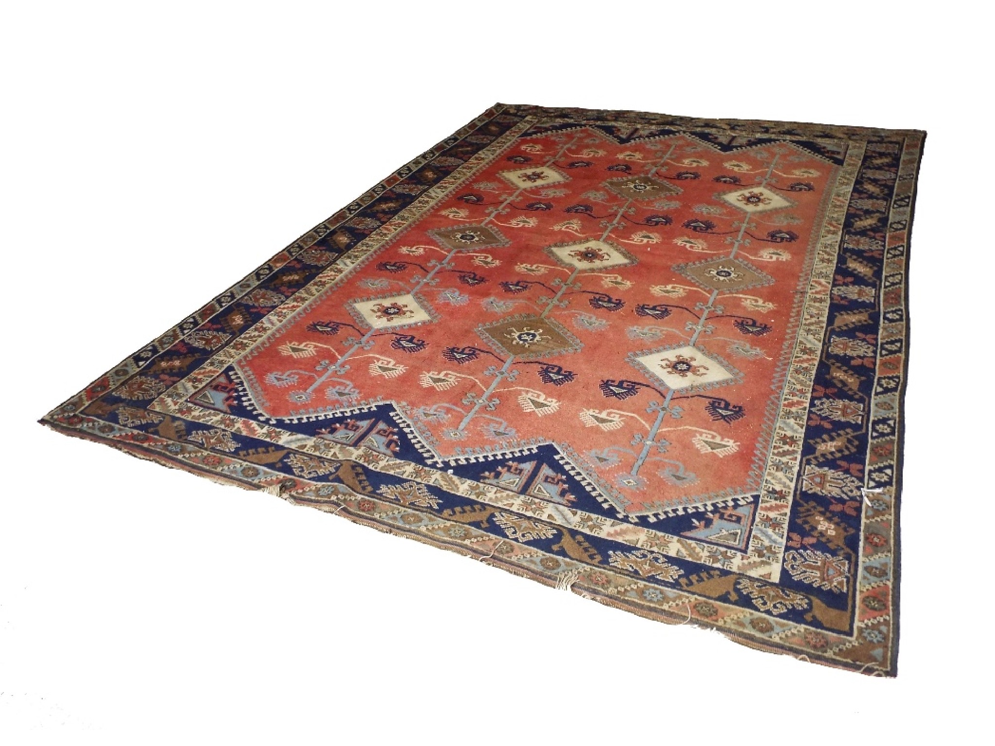 Appraisal: Large floor rug decorated with geometric motifs on an iron