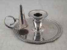 Appraisal: A Georgian silver chamber candlestick with extinguisher beaded rims No