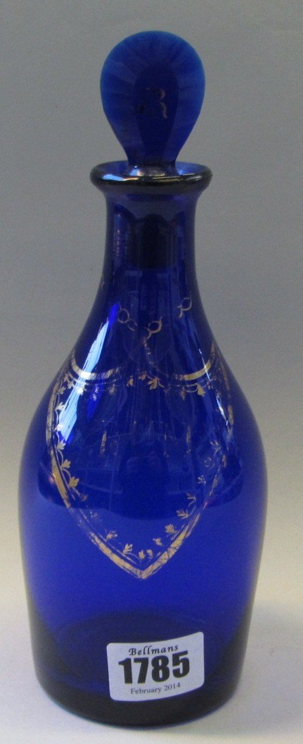 Appraisal: An early th century Bristol blue glass mallet shaped decanter