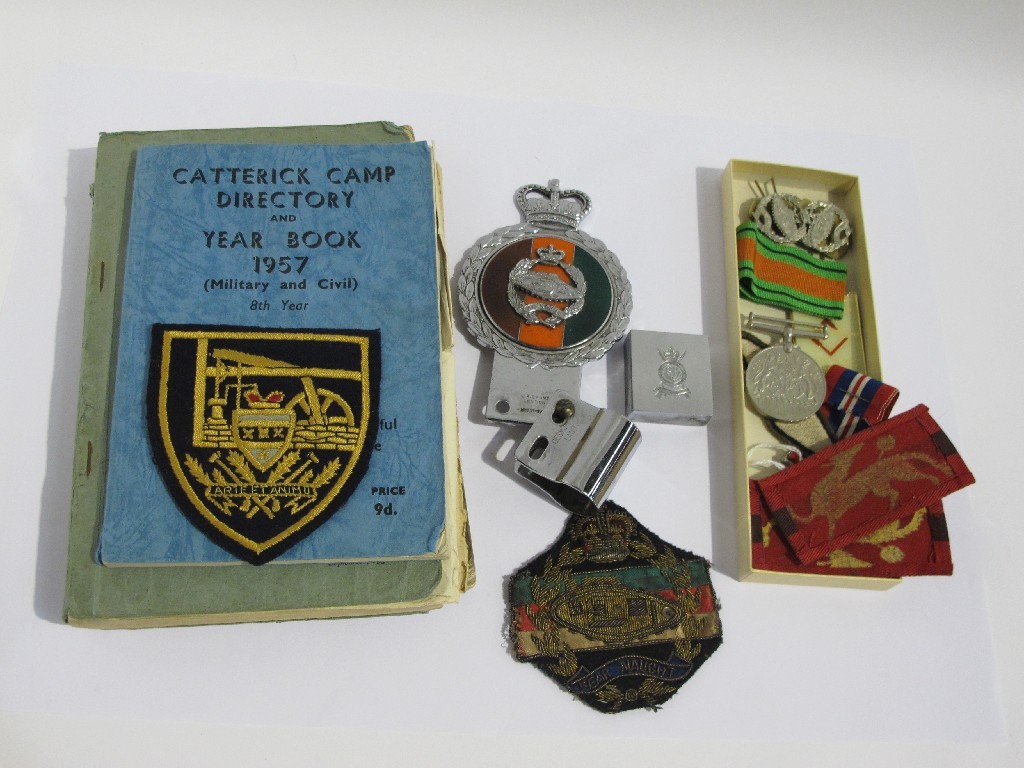 Appraisal: A lot comprising two WWII medals Tank Corp shoulder badges