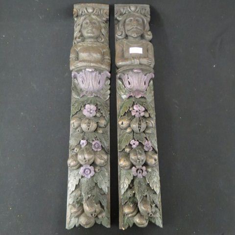 Appraisal: Pair of Carved Wooden Architectual Plaques or brackets man woman