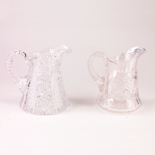 Appraisal: Two cut glass pitchers Minor nicks Unmarked Larger