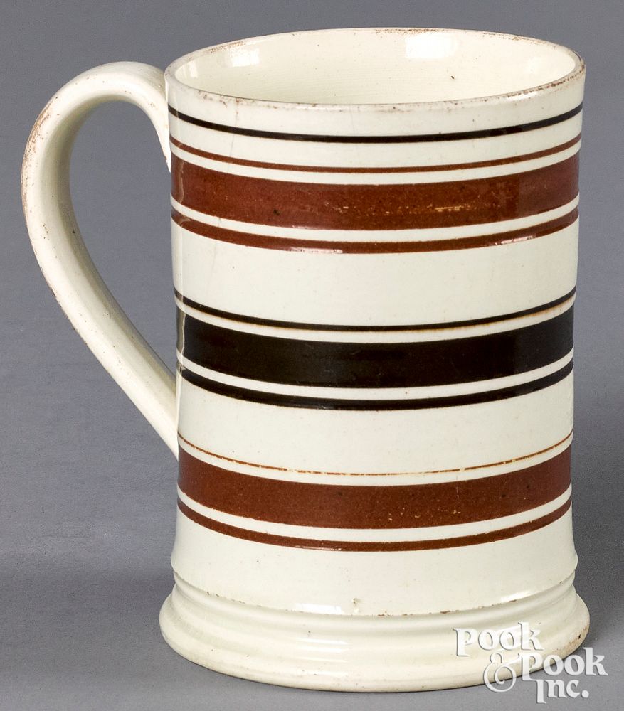 Appraisal: Mocha mug with brown and tan bands Mocha mug with