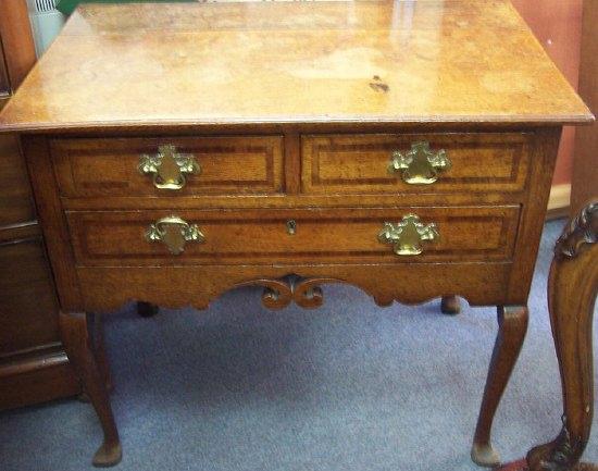 Appraisal: A th Century oak lowboy the rectangular top over two