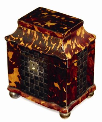 Appraisal: A late Regency tortoiseshell tea caddy with pewter stringing and