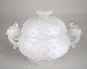 Appraisal: CHINESE WHITE JADE COVERED BOWLThe transparent vessel with a domed