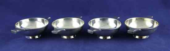 Appraisal: A set of four 's silver quaiches of plain circular