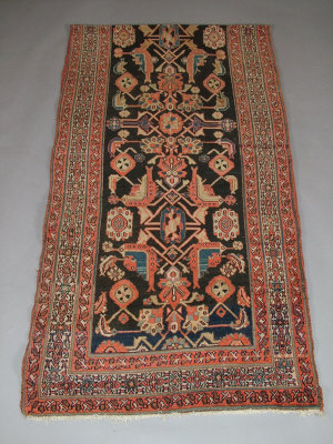 Appraisal: A Hamadan runner with geometric designs in an indigo field